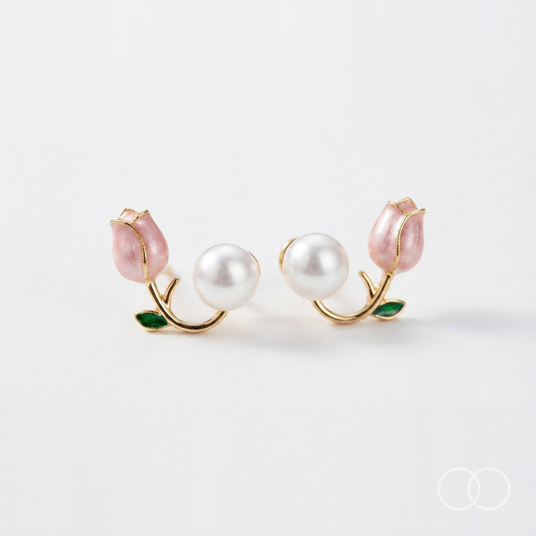 Close up of the pair on a plain pale ground, showing the tulip, the stem, the green leaf and the pearl back