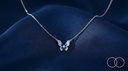 The butterfly pendant on deep blue silk