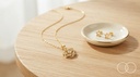 The Six-Point pendant on a pale wood table