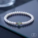 Bracelet_on_reflective_glass_sur…_202608211658.webp