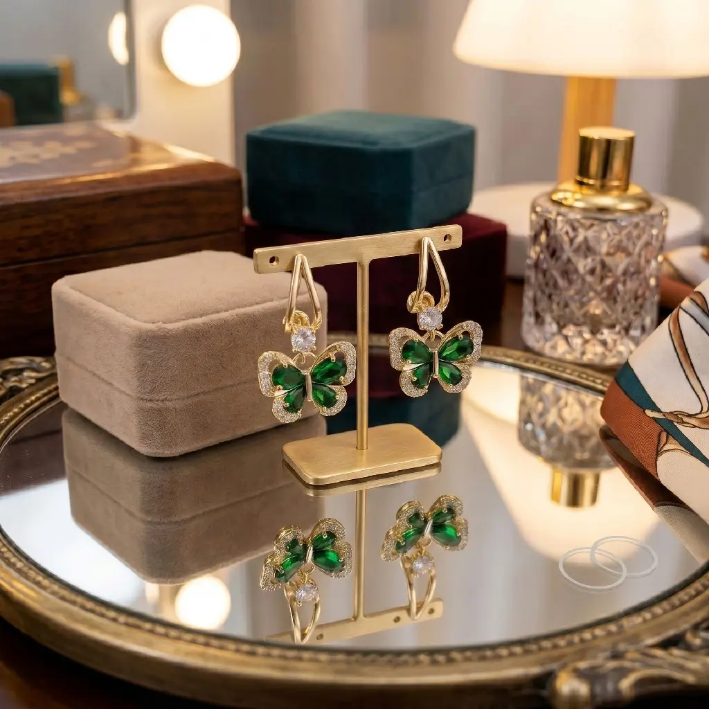 Emerald_earrings_on_mirrored_vanity_202608211715.webp